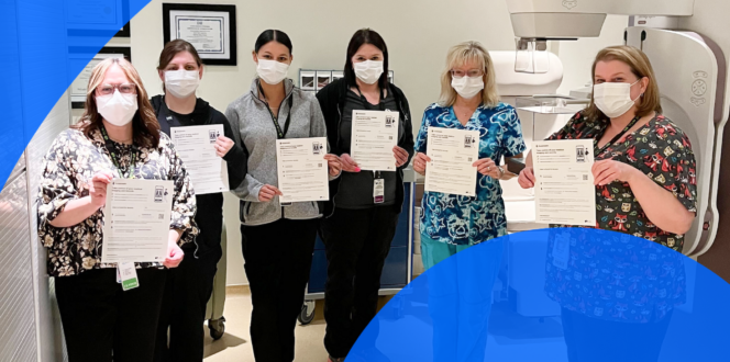 Sault Area Hospital Staff Holds PocketHealth Sign Up Forms for World Health Day Competition 2023