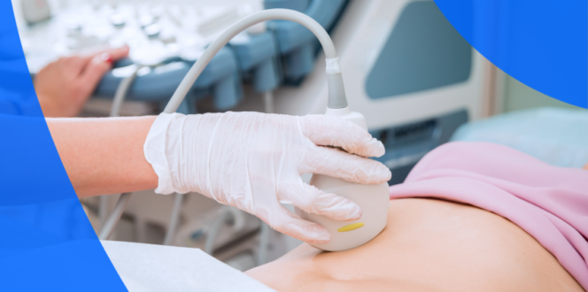 An ultrasound technician performing an abdominal scan on a woman