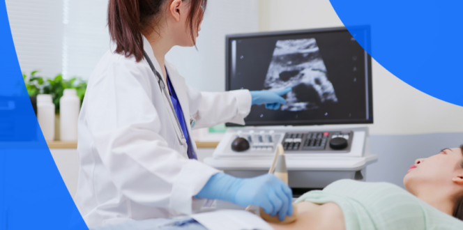 A technician performing an ultrasound on a patient