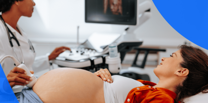 Pregnant patient and sonographer during a prenatal ultrasound